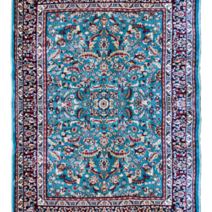 Luxurious turquoise hand-tufted rug inspired by Kashmiri floral meadows