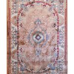 Elegant Persian-style rug in soft blush and ivory tones with intricate floral medallion design hand woven with wool and silk.