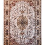 Hand-knotted luxury rug ‘Golden Minaret,’ made in India, featuring a gold and ivory medallion design with silk highlights evoking Mughal spires.