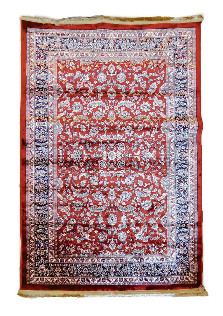 Handcrafted luxury wool rug ‘Persian Ruby,’ made in India featuring ivory floral arabesques on a rich scarlet-red field.
